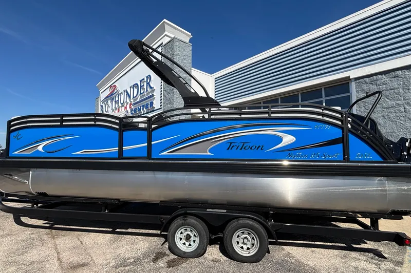 The Image of 2026 JC Neptoon 25TT Sport pontoon boat on trailer, displayed at Big Thunder Marine Center. - 1