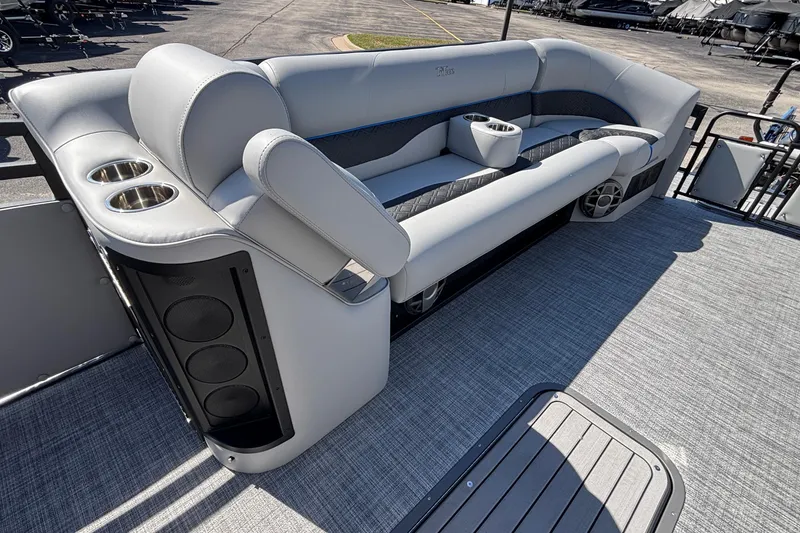 Slide: The Image of Luxurious seating on 2026 JC Neptoon 25TT Sport pontoon boat with cup holders and speakers. - 10