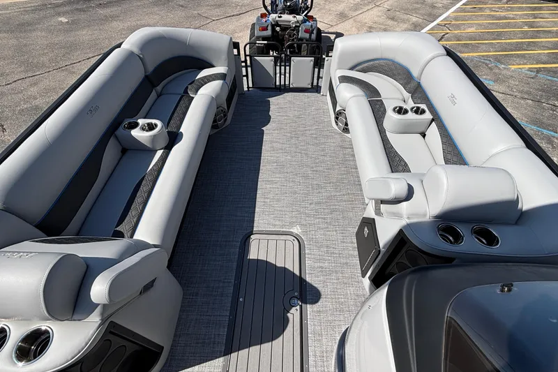 Slide: The Image of 2026 JC Neptoon 25TT Sport pontoon boat interior with luxurious seating and cup holders. - 11