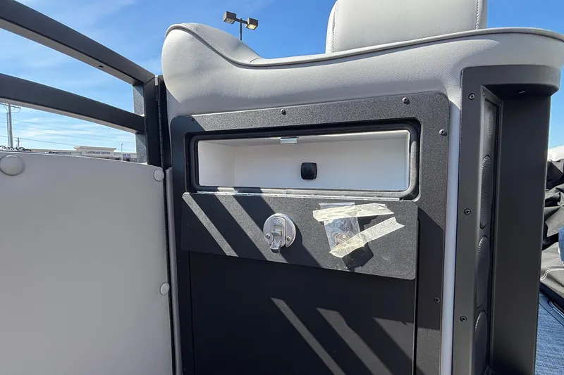 Slide: The Image of 2026 JC Neptoon 25TT Sport boat console with storage compartment and taped accessory. - 35