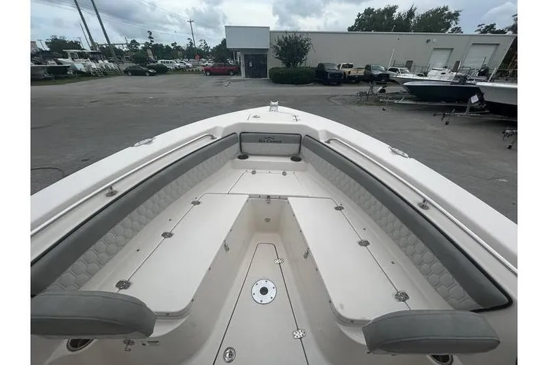 Slide: The Image of 2024 Sea Chaser 24 HFC boat interior with spacious seating and storage compartments. - 3