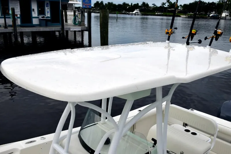 Slide: The Image of 2021 Sea Born SX239 Offshore boat docked at marina, front view. - 11