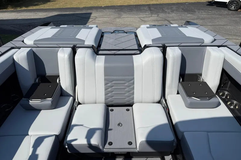 Slide: The Image of 2026 Malibu Wakesetter 26 LSV interior with luxurious gray seating and modern design. - 31
