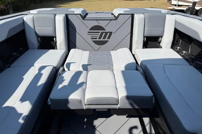 Slide: The Image of 2026 Malibu Wakesetter 26 LSV interior with luxurious gray seating and stylish design. - 32