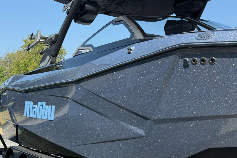 Slide: The Image of 2026 Malibu Wakesetter 26 LSV boat with sparkling exterior finish. - 8