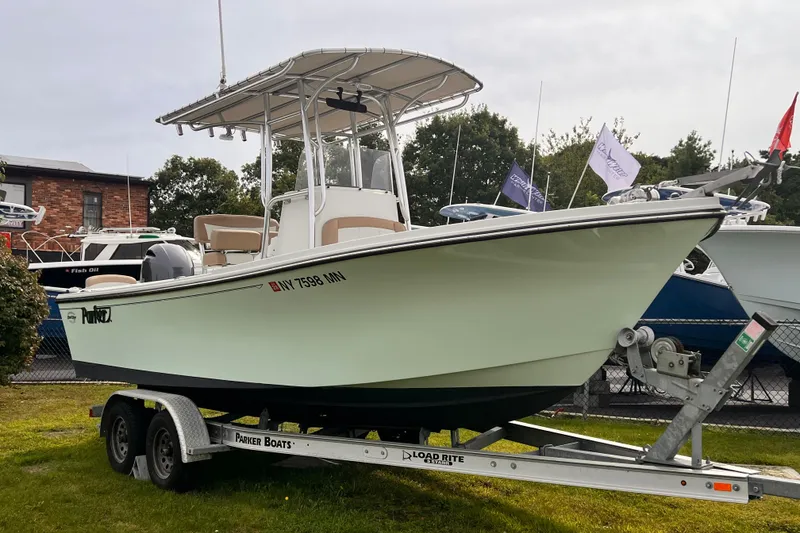 Slide: The Image of 2018 Parker 2100 Special Edition boat on trailer, displayed outdoors. - 0