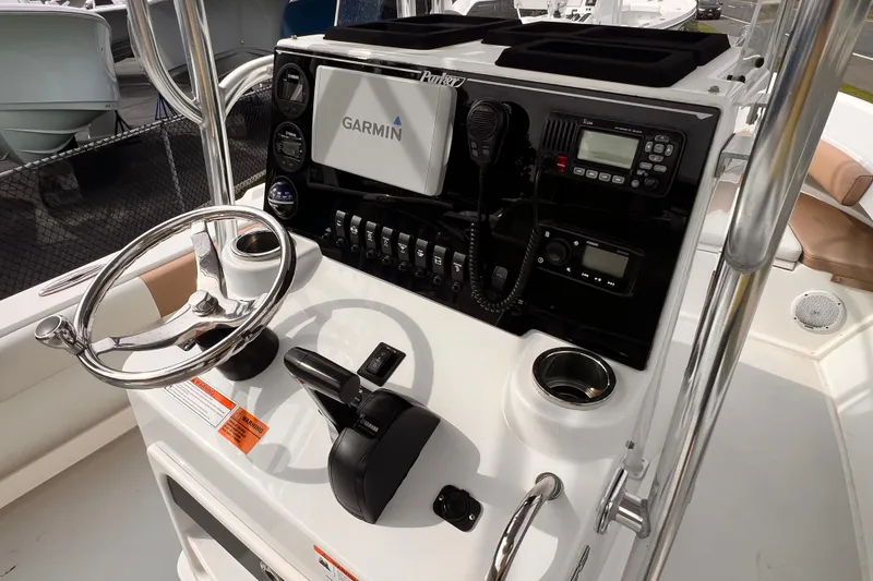 Slide: The Image of Control panel of a 2018 Parker 2100 Special Edition boat with Garmin navigation system. - 1