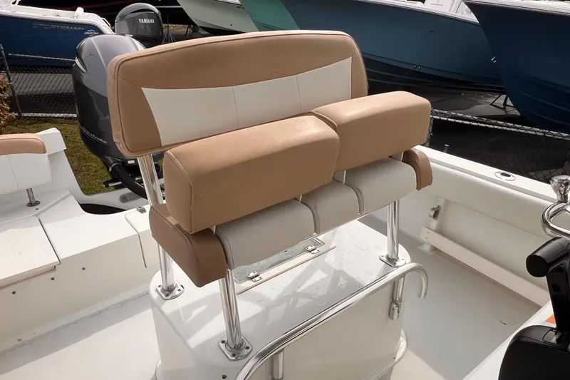Slide: The Image of 2018 Parker 2100 Special Edition boat with tan and white seating, featuring a Yamaha outboard motor. - 3
