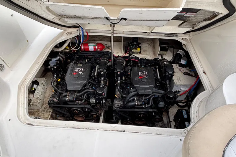 Slide: The Image of Engine compartment of a 2008 Sea Ray 290 Sundancer with dual MerCruiser engines. - 20