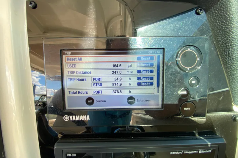 Slide: The Image of Yamaha display on showing current hours - 22