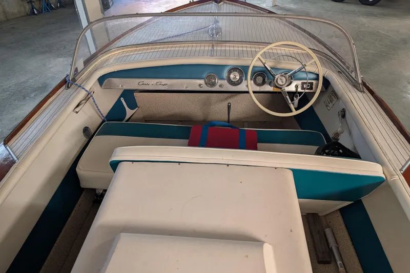 Slide: The Image of 1967 Chris-Craft 17 Sportsman boat interior with vintage steering wheel and dashboard. - 5