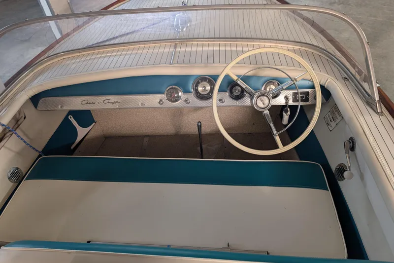 Slide: The Image of 1967 Chris-Craft 17 Sportsman boat interior with vintage steering wheel and dashboard. - 6
