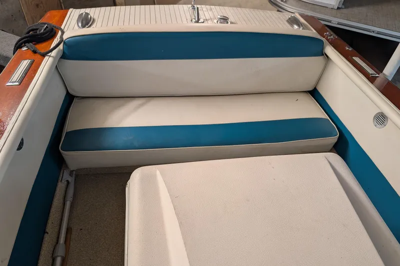 Slide: The Image of 1967 Chris-Craft 17 Sportsman boat interior with blue and white seating. - 8