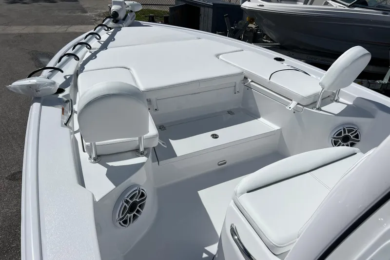 Slide: The Image of 2026 Sportsman Masters 247 Bay Boat interior with seating and storage compartments. - 10