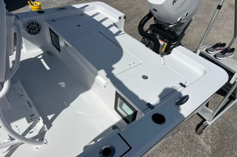 Slide: The Image of 2026 Sportsman Masters 247 Bay Boat deck with motor and accessories. - 15