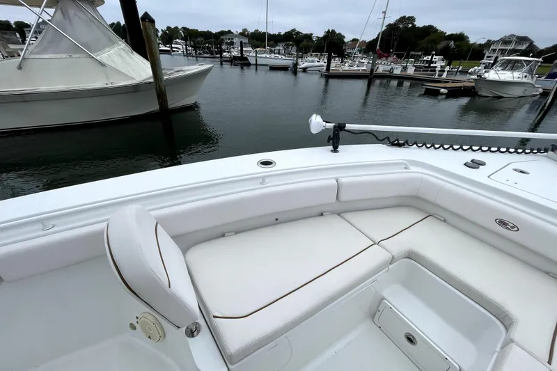 Slide: The Image of 2021 Sea Hunt Gamefish 27 Forward Seating boat docked in a marina. - 8
