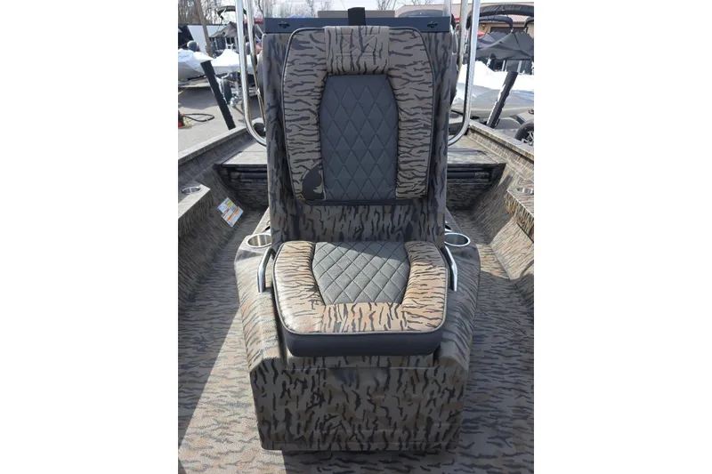 Slide: The Image of 2026 Xpress H20B Bay boat seat with camouflage pattern and diamond-stitched upholstery. - 13