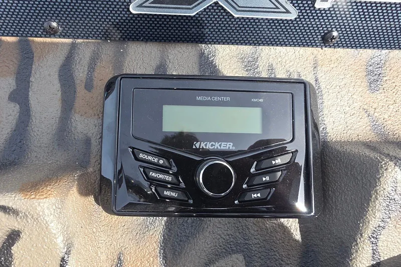 Slide: The Image of Kicker media center in 2026 Xpress H20B Bay boat dashboard. - 18