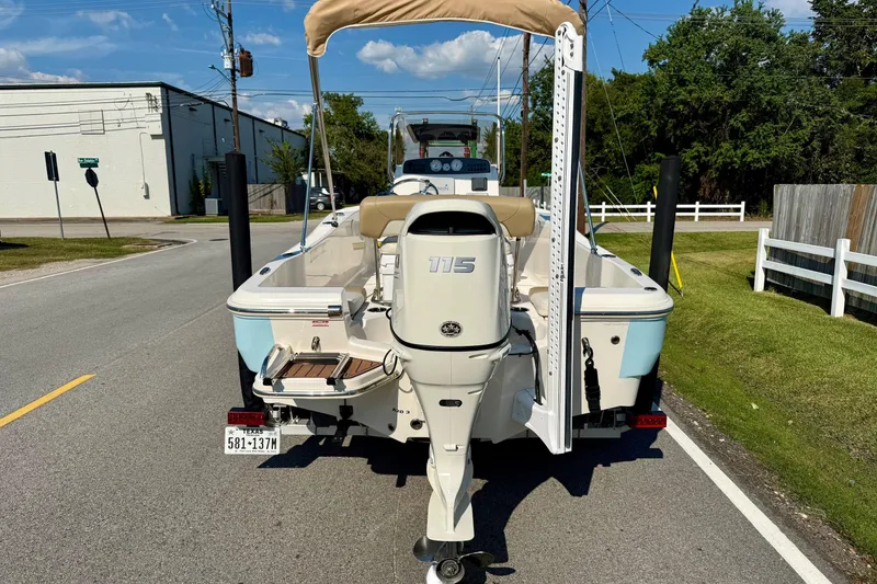 Slide: The Image of 2020 Pioneer 180 Sportfish boat with Yamaha 115 engine on a street. - 3