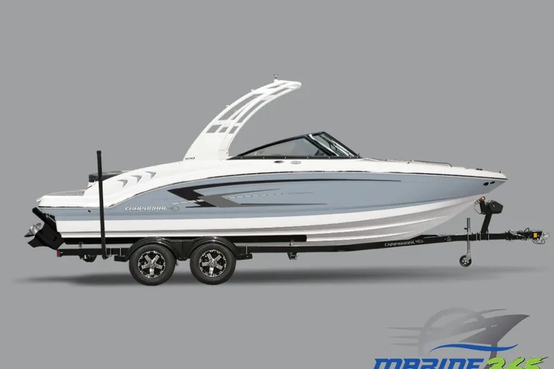 Slide: The Image of 2026 Chaparral 21 SSi boat displayed indoors on a blue carpet. - 1