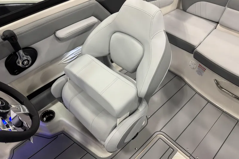 Slide: The Image of 2026 Chaparral 21 SSi boat interior with sleek seating and modern design. - 12