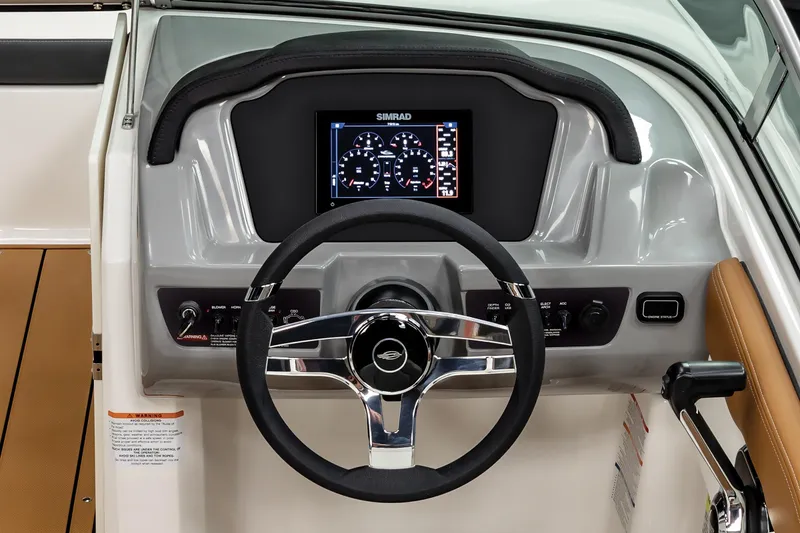 Slide: The Image of 2026 Chaparral 21 SSi boat displayed indoors on a blue carpet. - 2