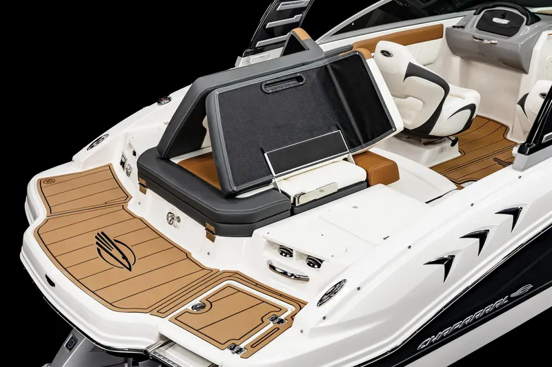 Slide: The Image of 2026 Chaparral 21 SSi boat interior with sleek dashboard and cup holder. - 7