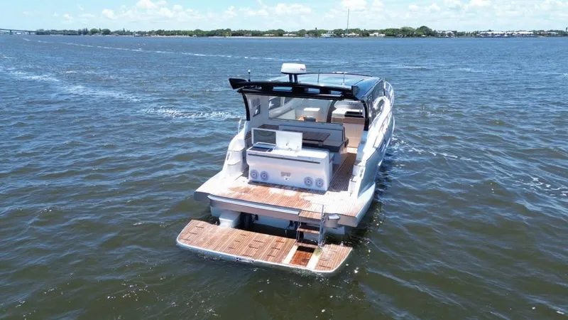 Slide: The Image of Luxury yacht "Real 40 HT" cruising on open water, 2025 model. - 19