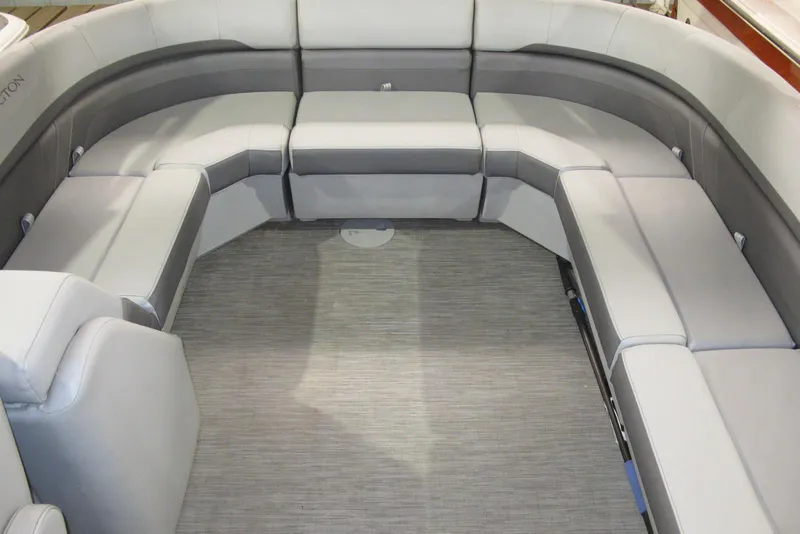 Slide: The Image of 2022 Bennington SX 22 Fishing boat interior with spacious gray seating arrangement. - 6