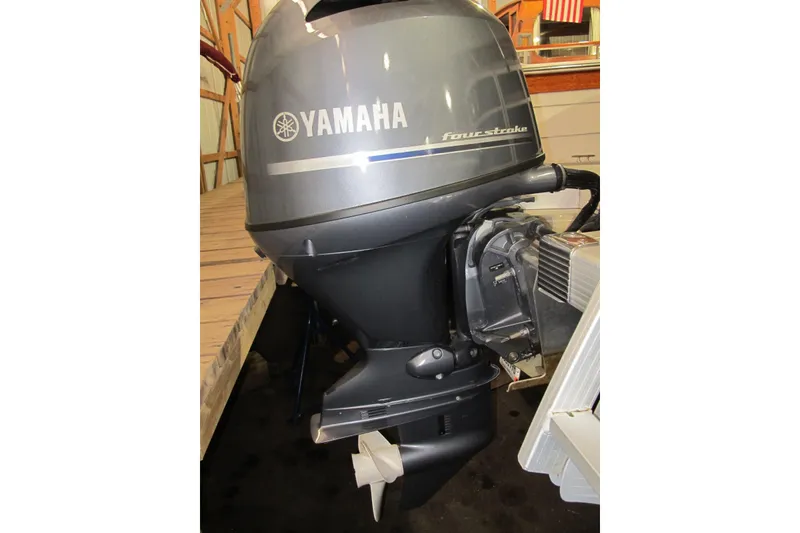 Slide: The Image of Yamaha four-stroke outboard motor on 2022 Bennington SX 22 Fishing boat. - 9