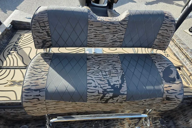 Slide: The Image of 2026 Xpress H20B Bay boat seats with camouflage and diamond-patterned upholstery. - 21