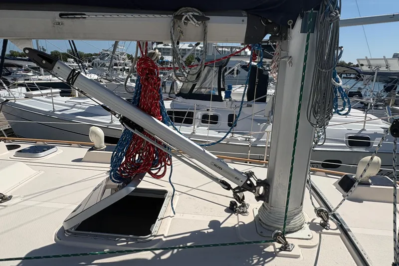 Slide: The Image of Sailboat deck of 1995 Island Packet 40 with rigging and ropes in marina. - 16