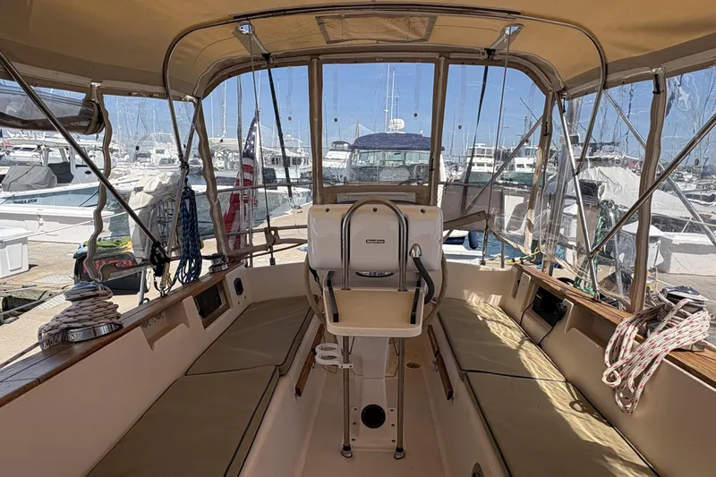 Slide: The Image of Cockpit of a 1995 Island Packet 40 sailboat docked at a marina. - 21
