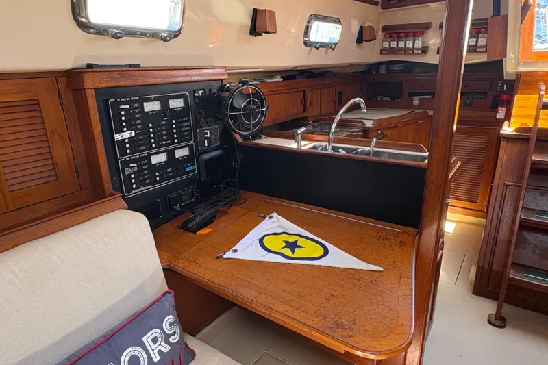 Slide: The Image of Interior of a 1995 Island Packet 40 sailboat with navigation station and galley. - 30