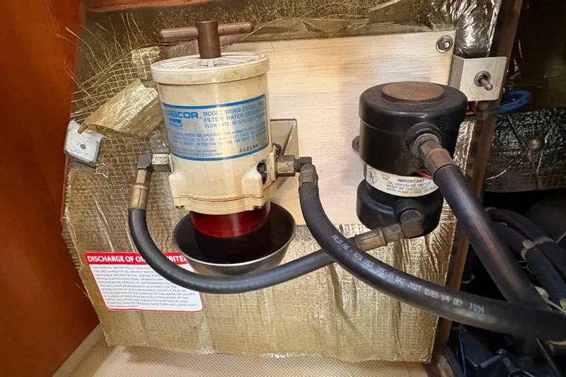 Slide: The Image of Diesel filter system on a 1995 Island Packet 40 sailboat. - 59