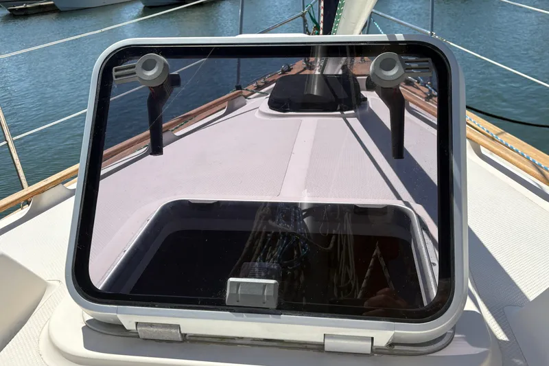 Slide: The Image of Hatch on 1995 Island Packet 40 sailboat deck, open to reveal interior. - 66