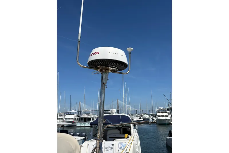 Slide: The Image of Radar equipment on a 1995 Island Packet 40 sailboat in a marina. - 68