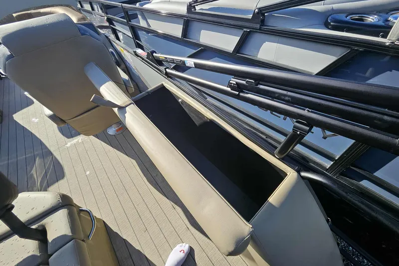 Slide: The Image of Interior of 2026 Starcraft EXS 3 Q DH boat with storage compartment open. - 14