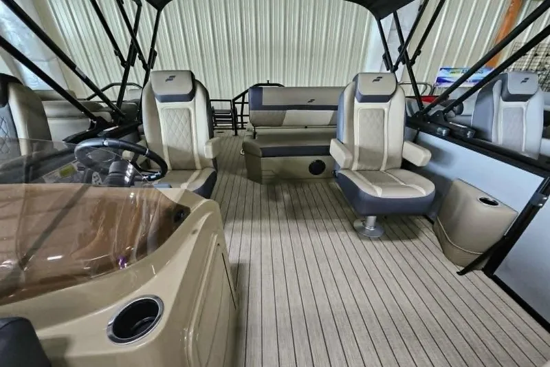 Slide: The Image of 2026 Starcraft EXS 3 Q DH boat interior with luxurious seating and modern design. - 21