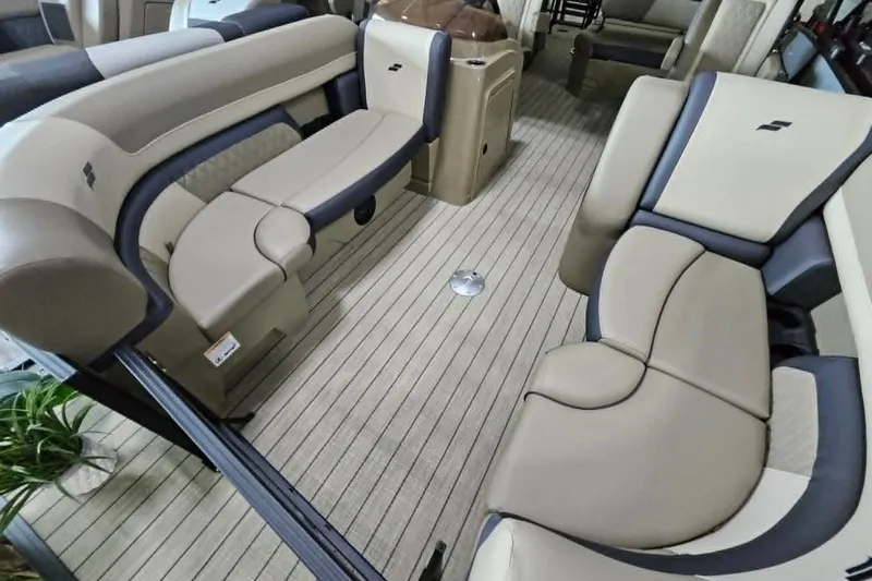 Slide: The Image of Luxurious interior of 2026 Starcraft EXS 3 Q DH boat with plush seating. - 23