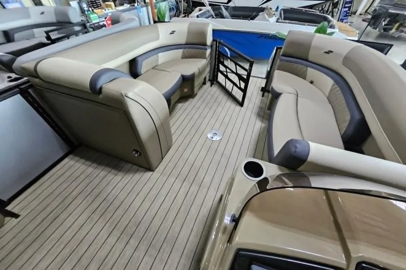 Slide: The Image of Luxurious interior of 2026 Starcraft EXS 3 Q DH pontoon boat with plush seating. - 24