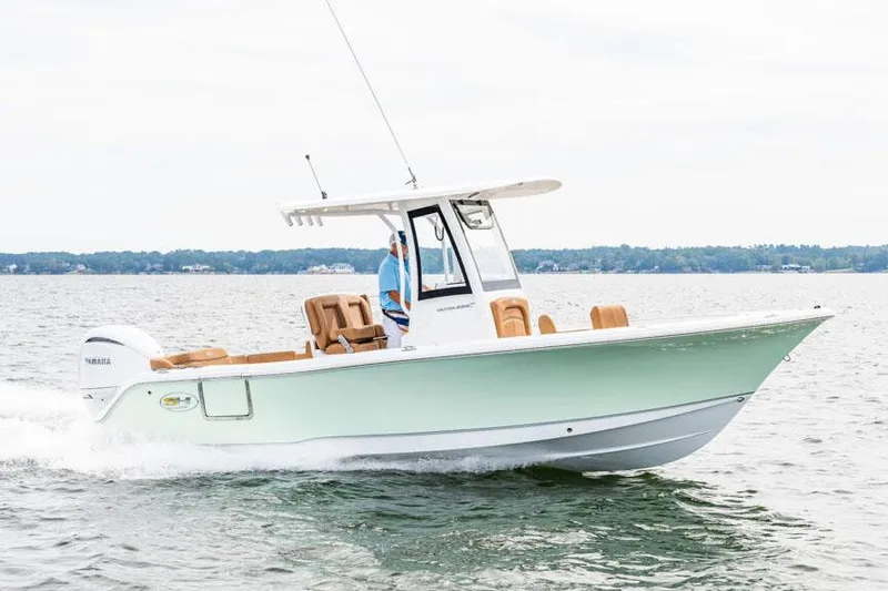 Slide: The Image of Manufacturer Provided Image: 2026 Sea Hunt Ultra 235 SE boat cruising on open water. - 52
