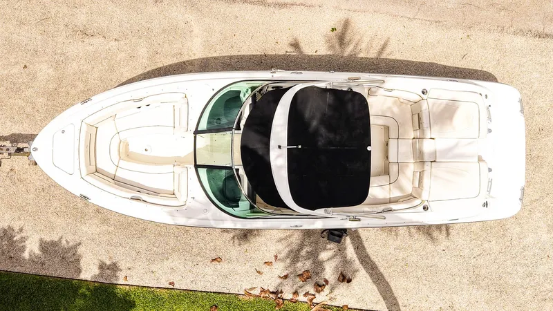 Slide: The Image of Overhead view of 2010 Sea Ray 270 SLX boat on sandy surface. - 6