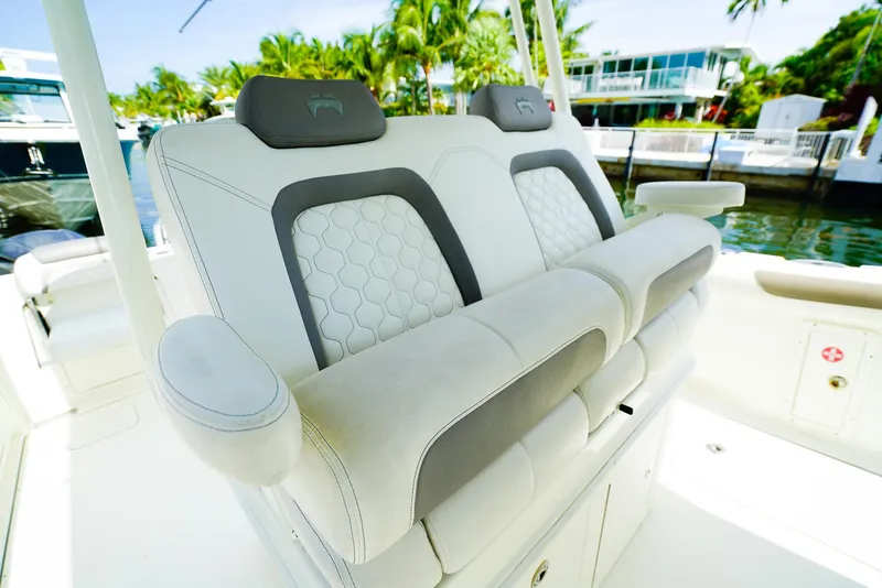 Slide: The Image of Luxurious seating on 2018 World Cat 320 CC boat, featuring elegant design and comfort. - 21
