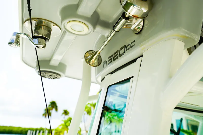 Slide: The Image of Close-up of 2018 World Cat 320 CC boat details, showcasing horn and sleek design. - 30