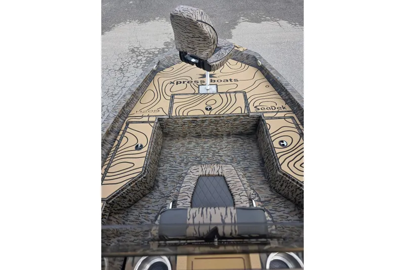 Slide: The Image of 2026 Xpress H20B Bay boat with custom SeaDek flooring and unique topographic design. - 30