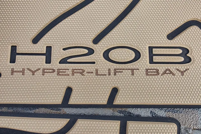 Slide: The Image of 2026 Xpress H20B Hyper-Lift Bay logo on textured surface. - 32