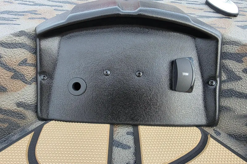 Slide: The Image of Control panel of 2026 Xpress H20B Bay boat with trim switch. - 35