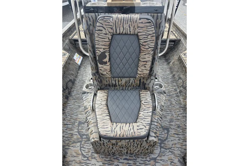 Slide: The Image of 2026 Xpress H20B Bay boat seat with tiger stripe pattern and quilted design. - 37
