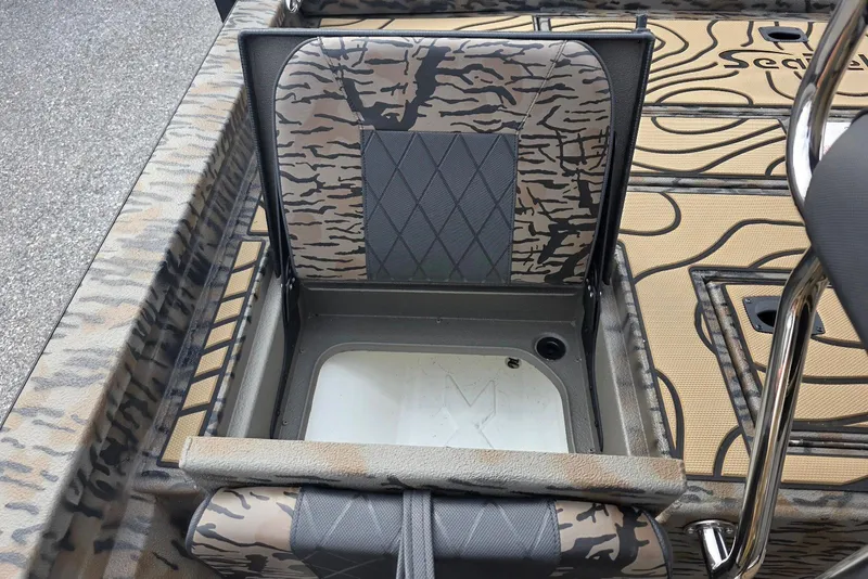Slide: The Image of 2026 Xpress H20B Bay boat seat with camouflage design and storage compartment. - 45